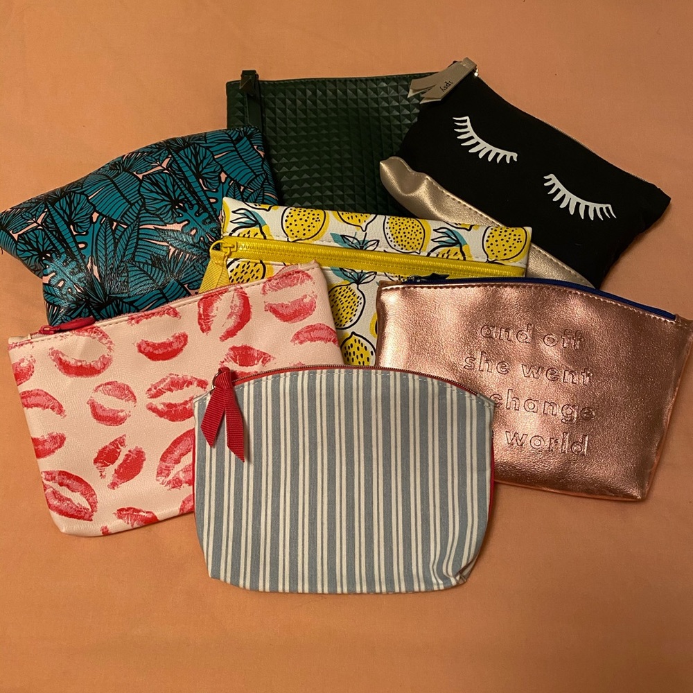 TEN BRAND NEW COSMETIC BAGS.  PRICING VARIED
